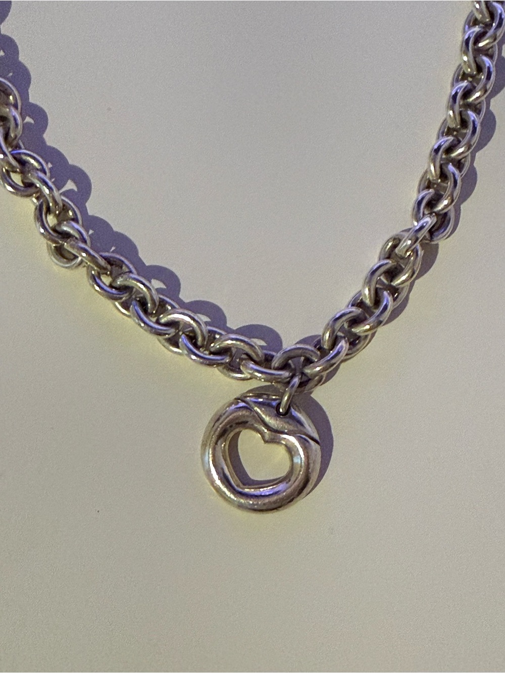 Movado Silver Heart Cutout Pendant Necklace